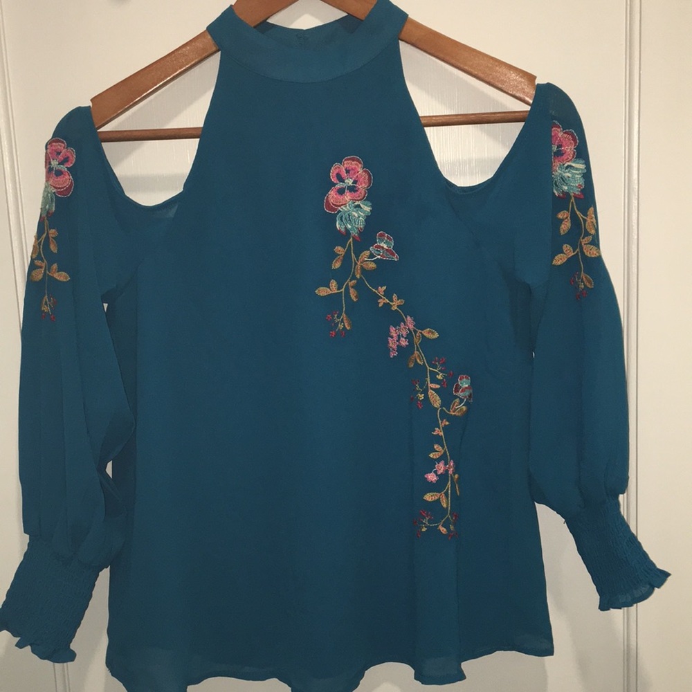 Blue shirt with floral design